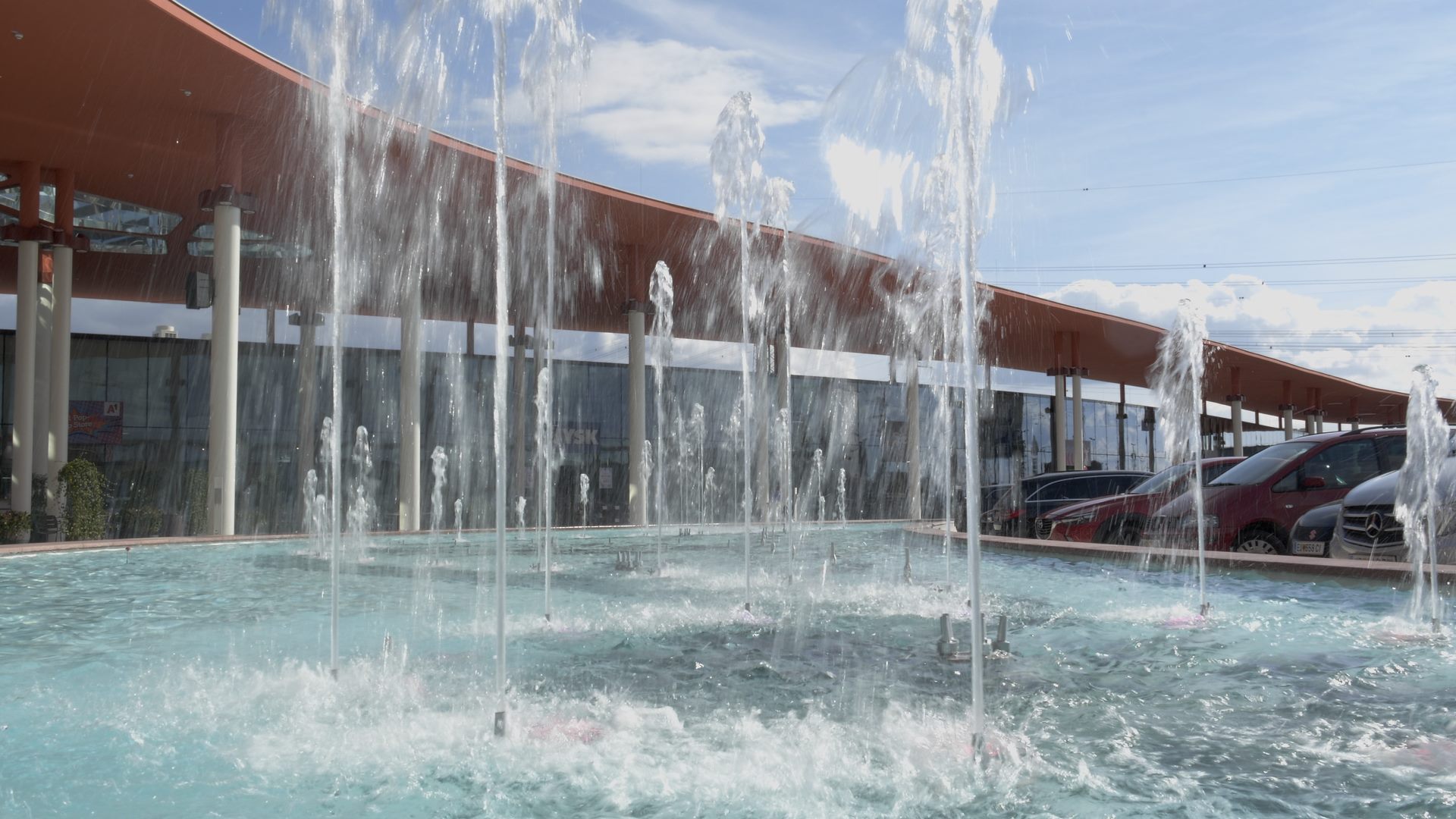 A Polyflex fountain with water coming out of it.