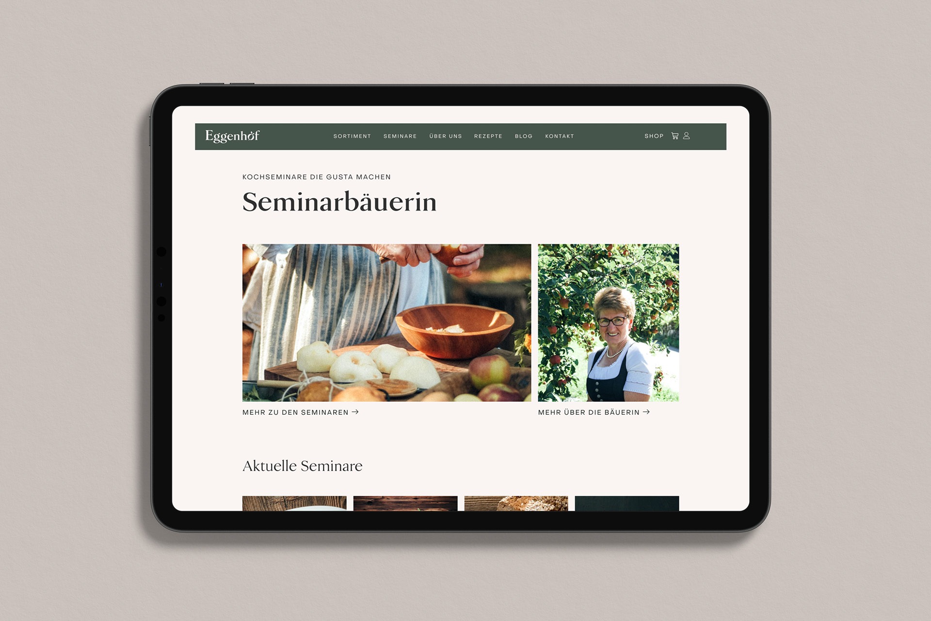 A tablet displaying the homepage of the Eggenhof website.