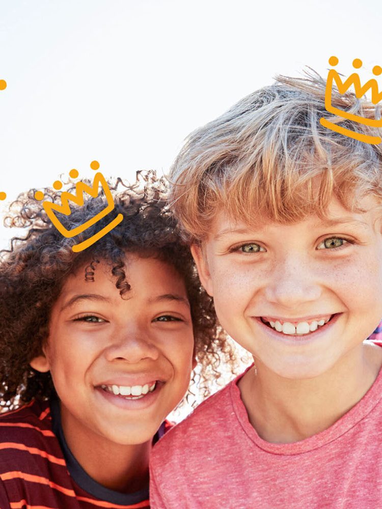 A group of champs with crowns on their heads.