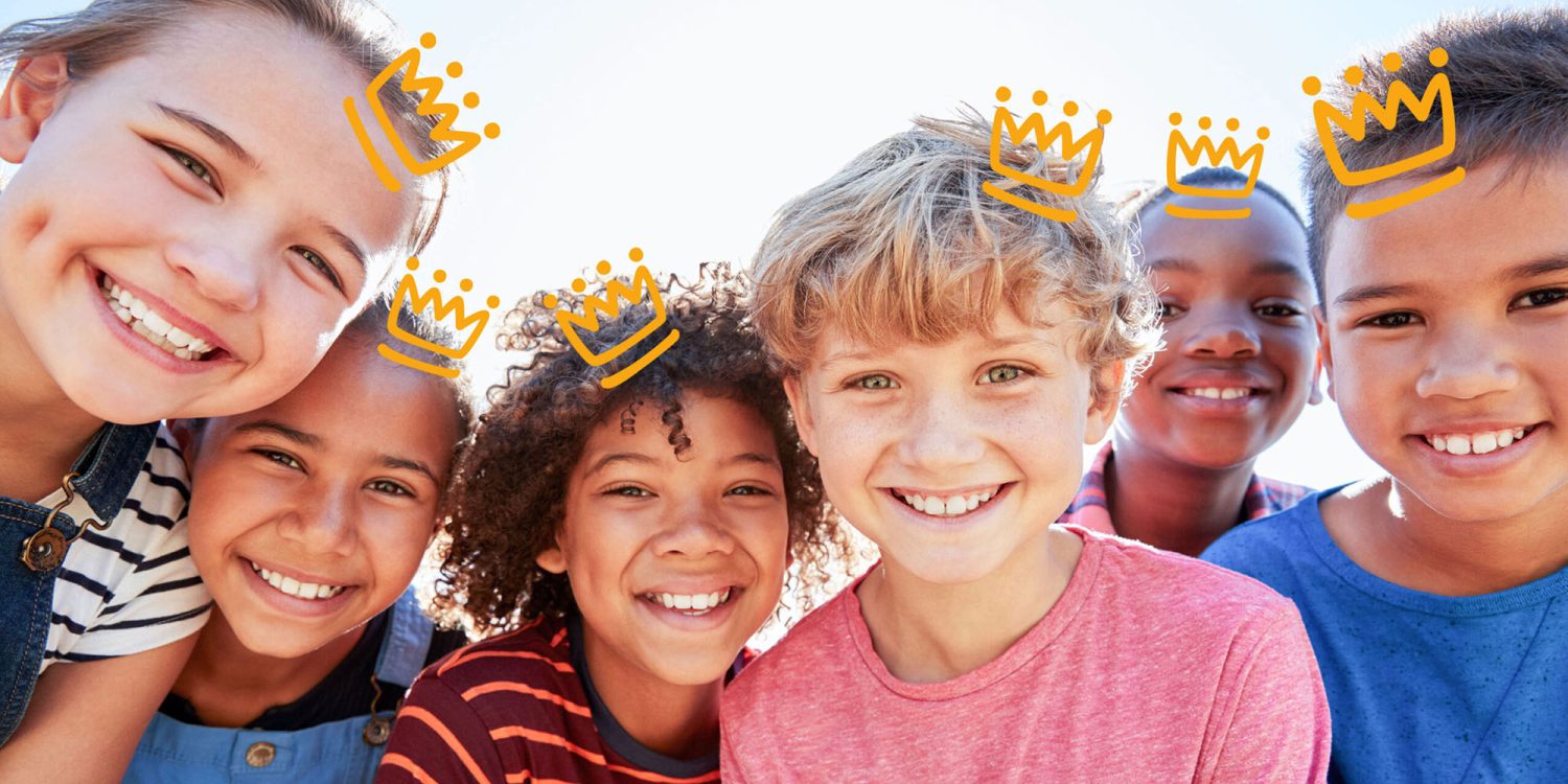 A group of champs with crowns on their heads.