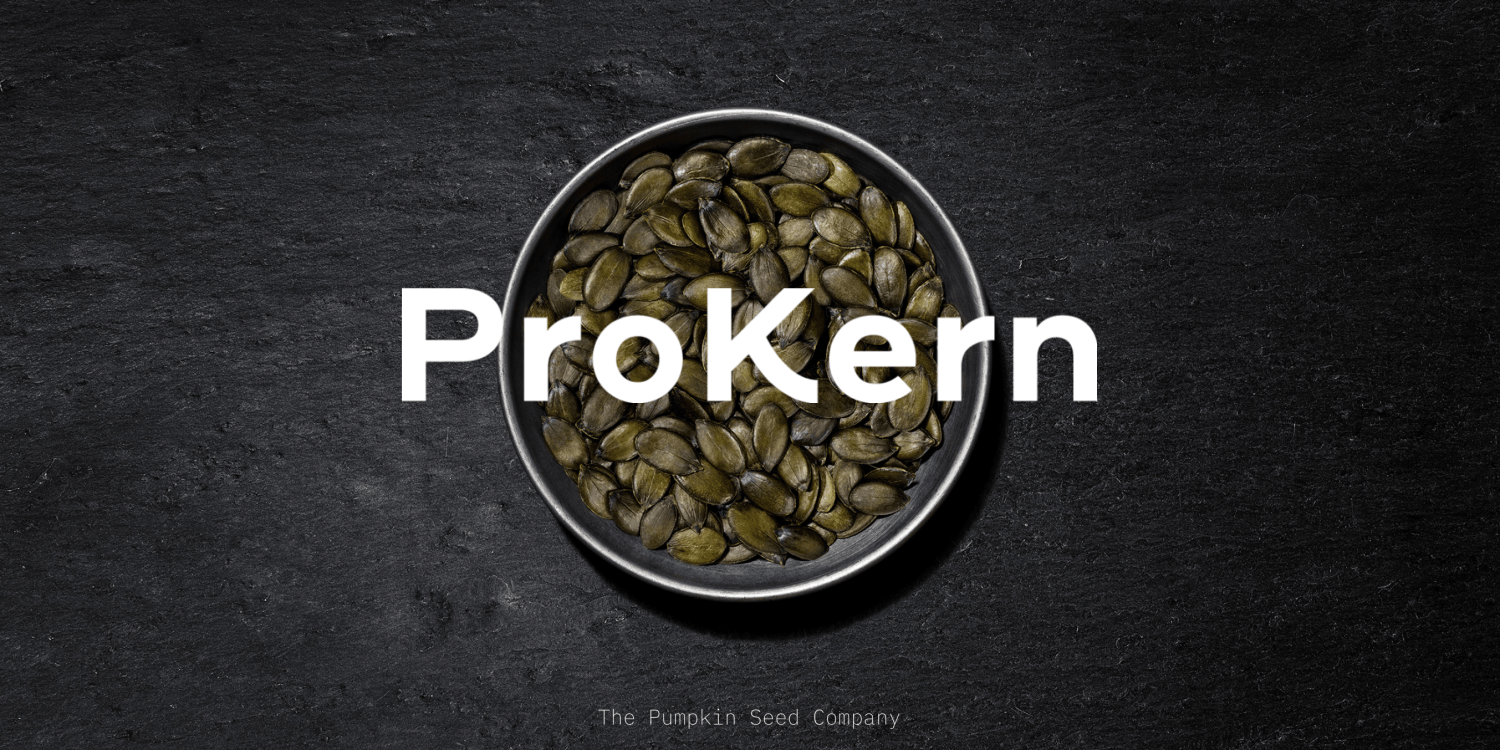 A bowl of pumpkin seeds with the word 'ProKern' on it.