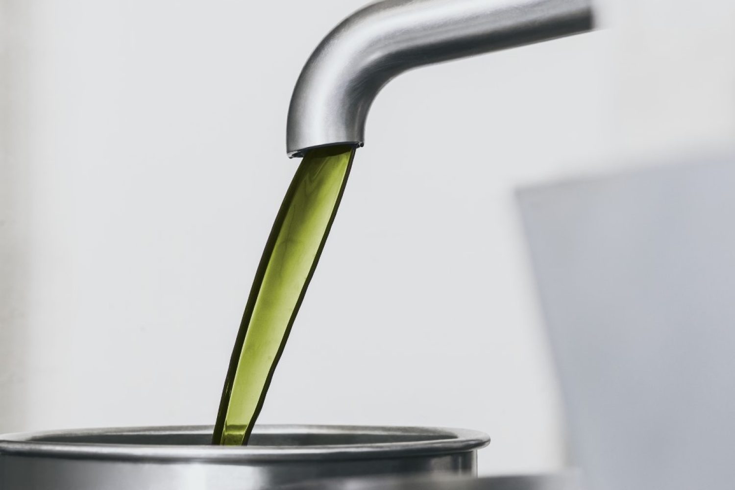 Olive oil being poured into a ProKern metal pot.