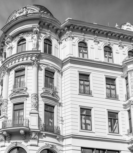 A photo of an old building in black and white.